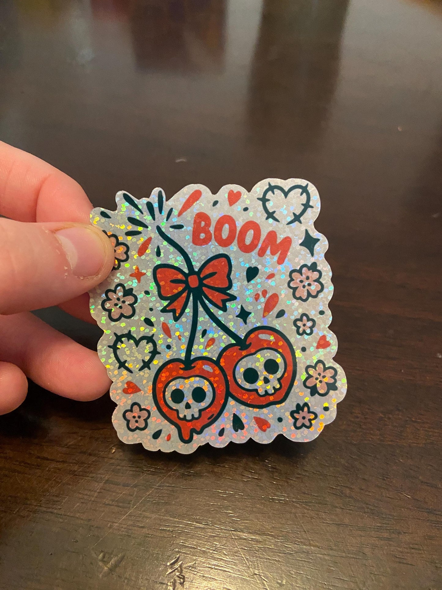 Cherry Bomb Skull Sticker | Cute Goth Cherry Decal | Red Bow Kawaii Skull Art | Holographic Sticker for Laptop, Journal, or Water Bottle